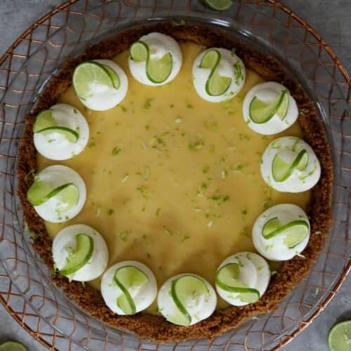 Key lime pie in a glass pie dish