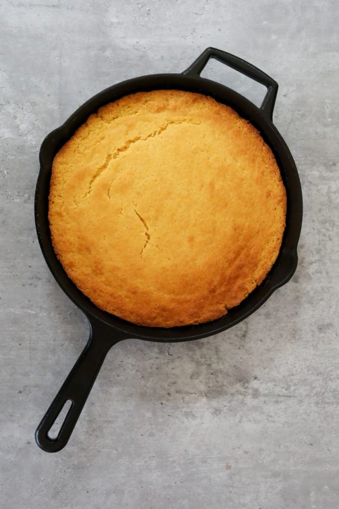 Cast iron skillet with cooked cornbread