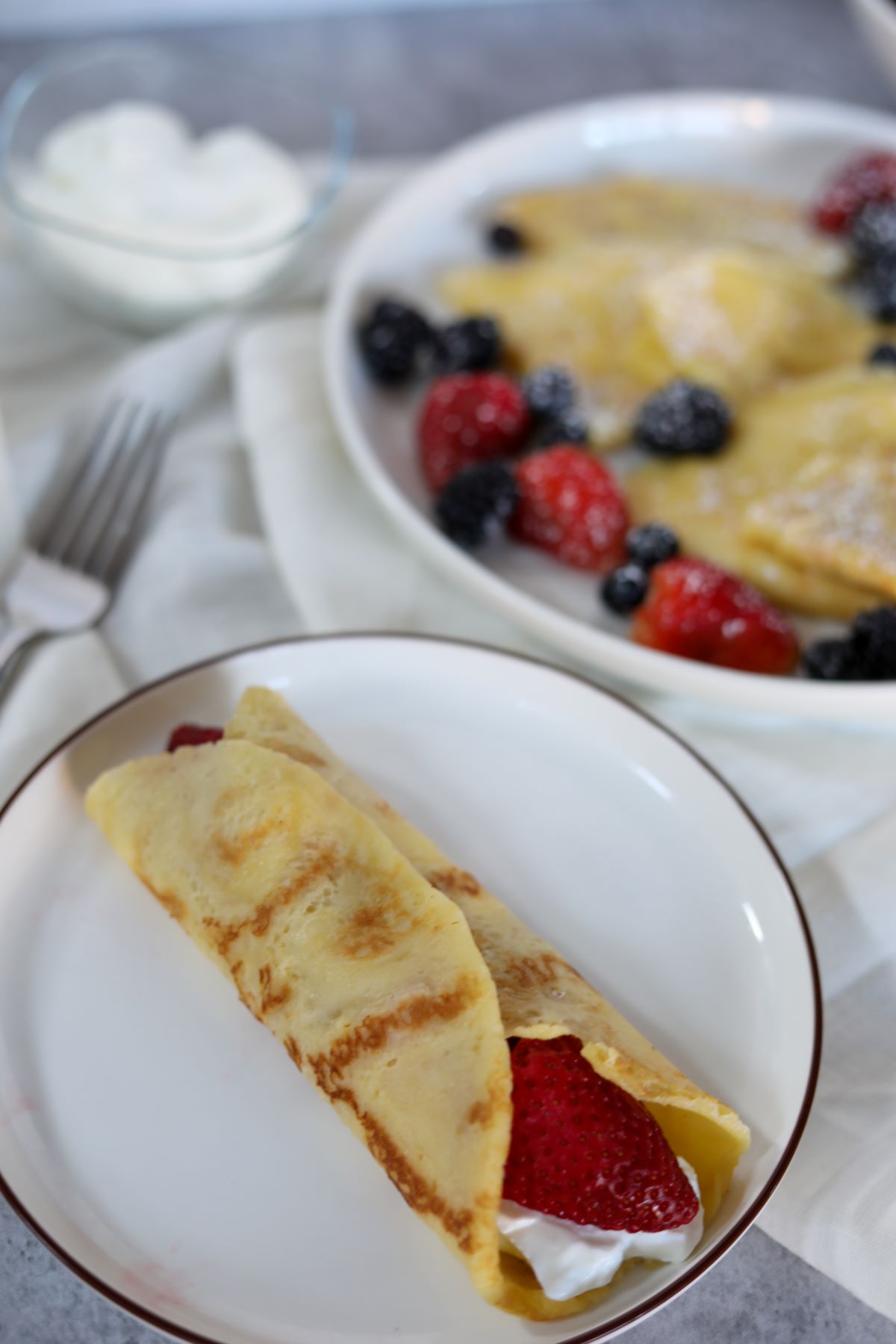 rolled crepe with fresh strawberries