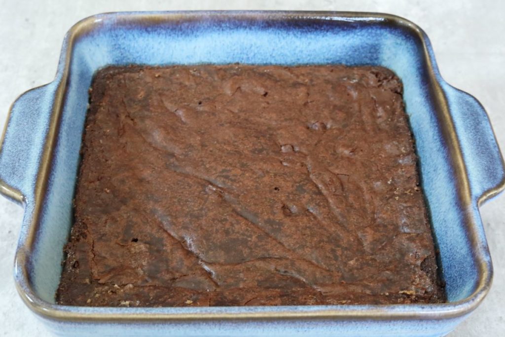 cooked brownies in a baking dish