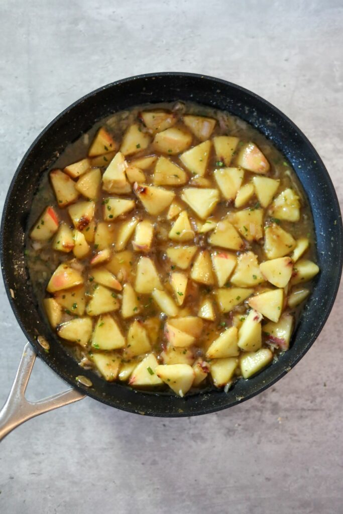 Cooked peach sauce in a pan