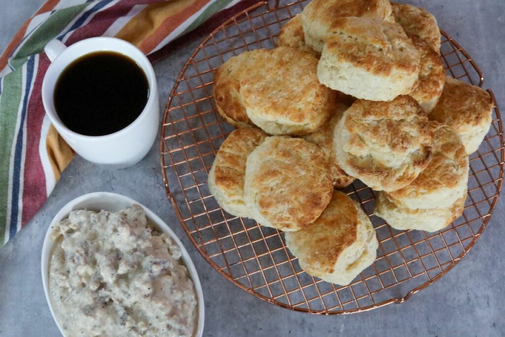 Cooling biscuits near a bowl of gravy