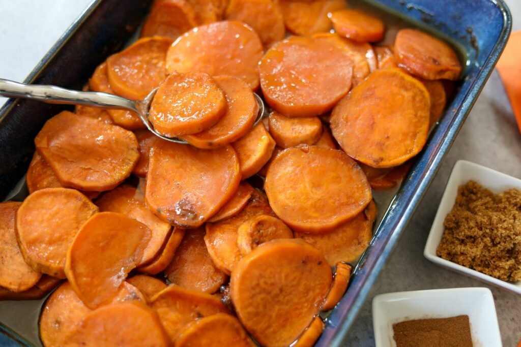 Cooling sweet potatoes in a blue baking dish