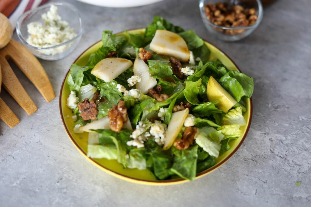 Pear salad on a yellow plate