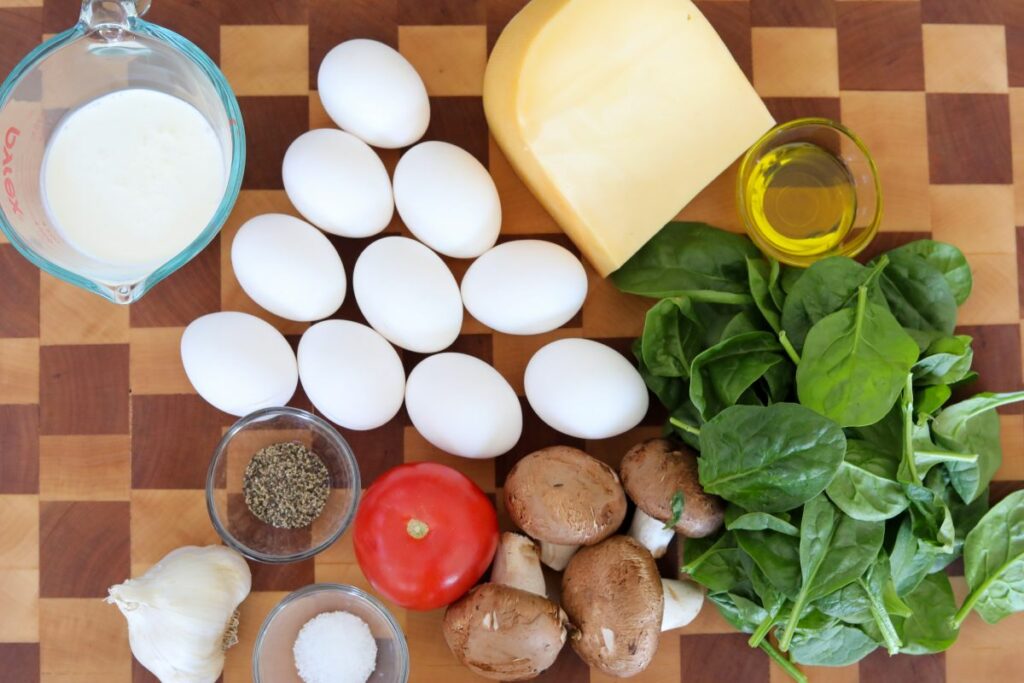 Frittata ingredients on a wooden cutting board