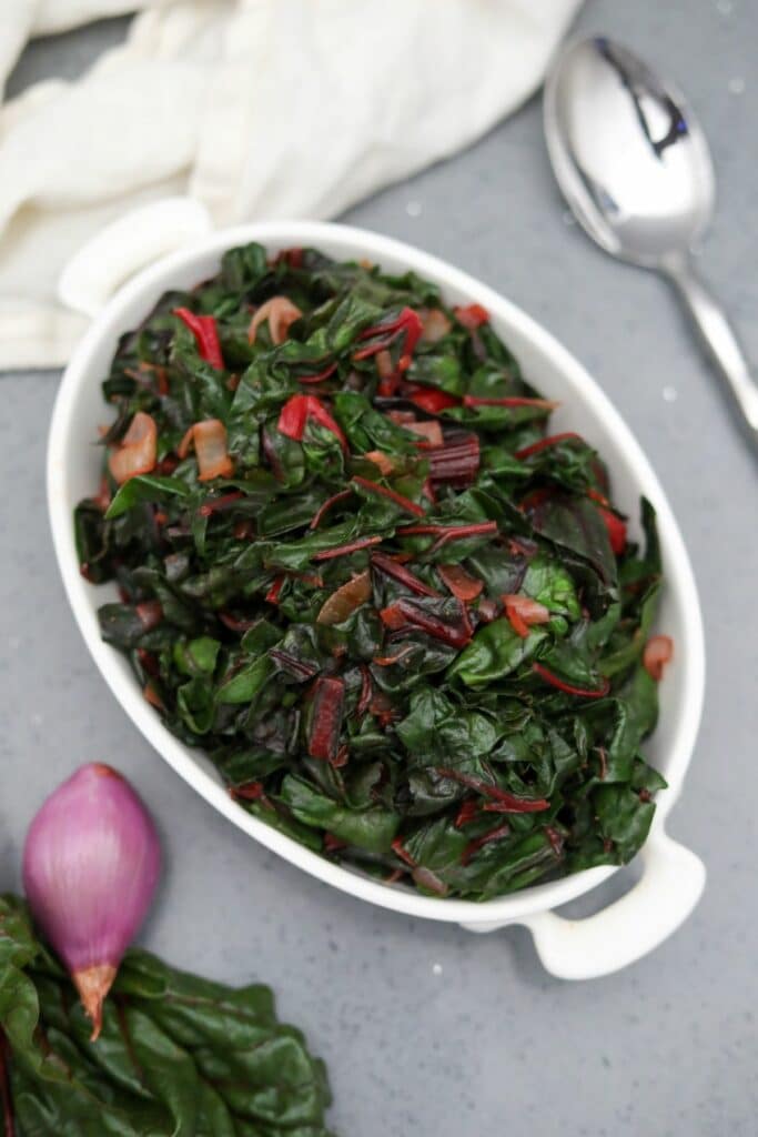 Sauteed Swiss chard in a white bowl