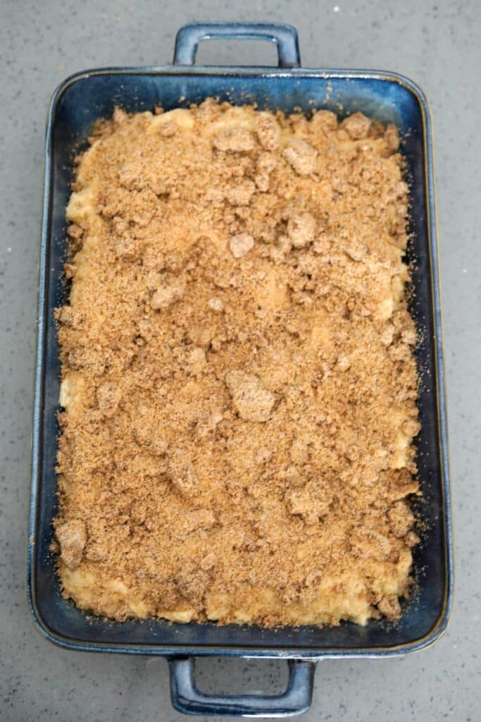 Streusel topping on unbaked apple coffee cake
