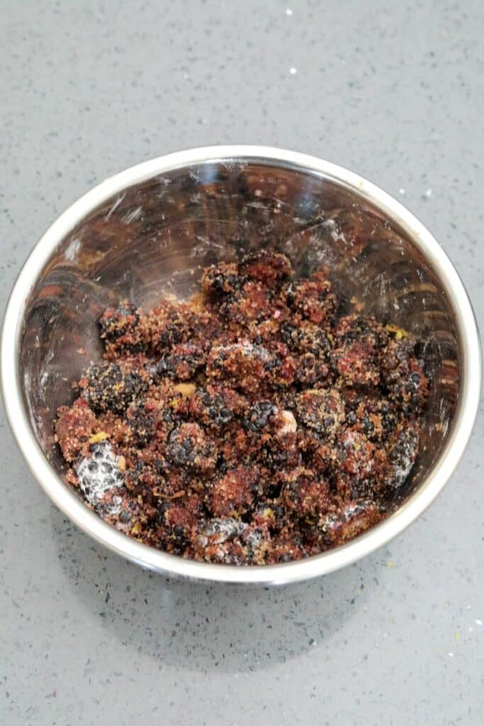 Mixed blackberry filling in a mixing bowl