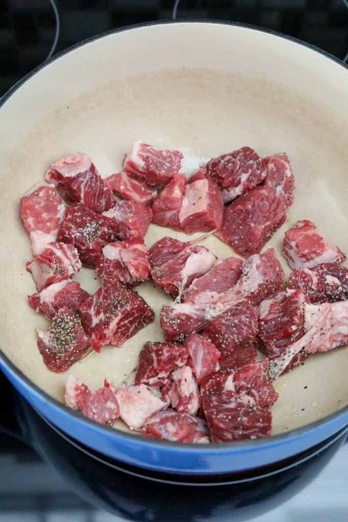 Beef cubes in a Dutch oven
