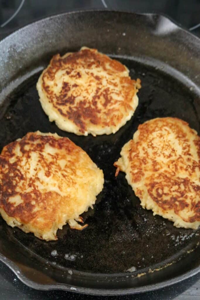 Cooked boxty in an iron skillet
