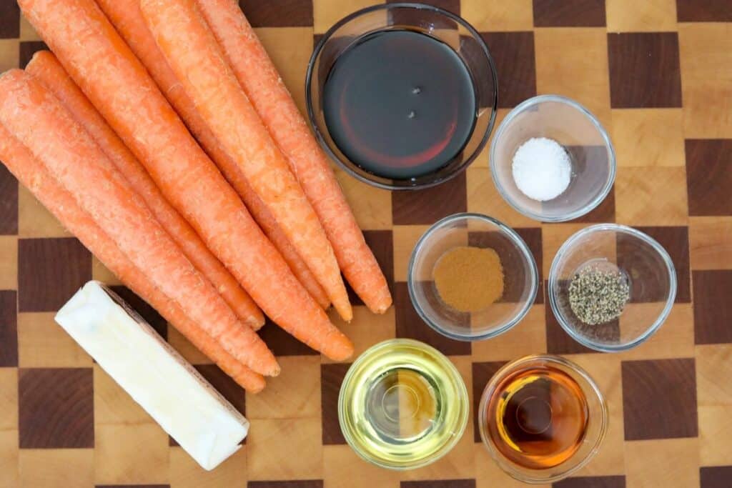Glazed carrot ingredients on a wooden cutting board