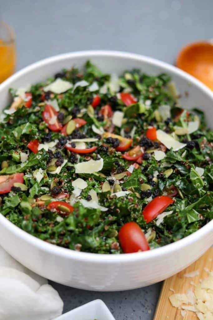 kale salad in a white bowl