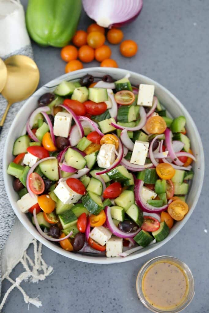Greek salad in a marble serving bowl