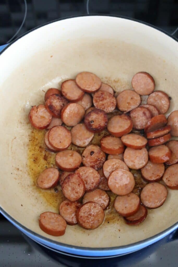Cooked sausage in a Dutch oven