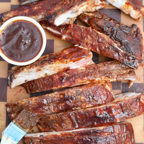 barbecue ribs on a wooden cutting board