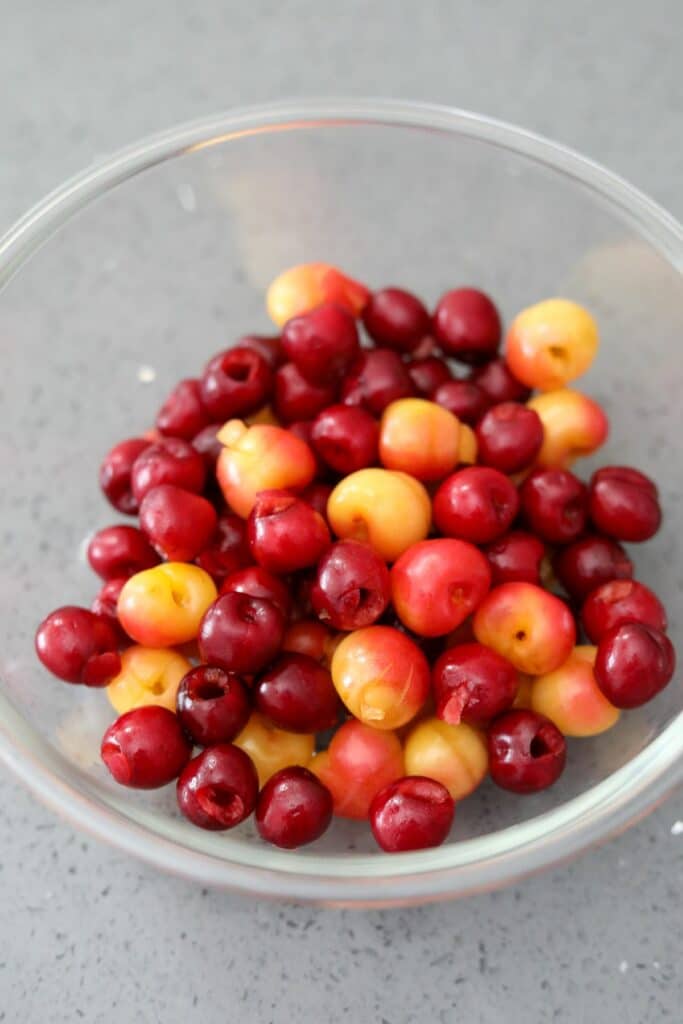 cherries and kirsch in a bowl