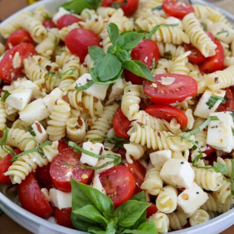 A bowl of Caprese pasta salad