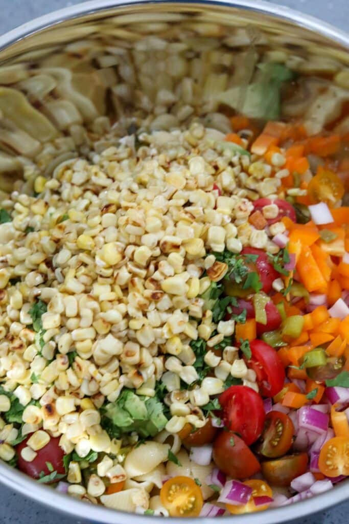 Metal mixing bowl with salad ingredients