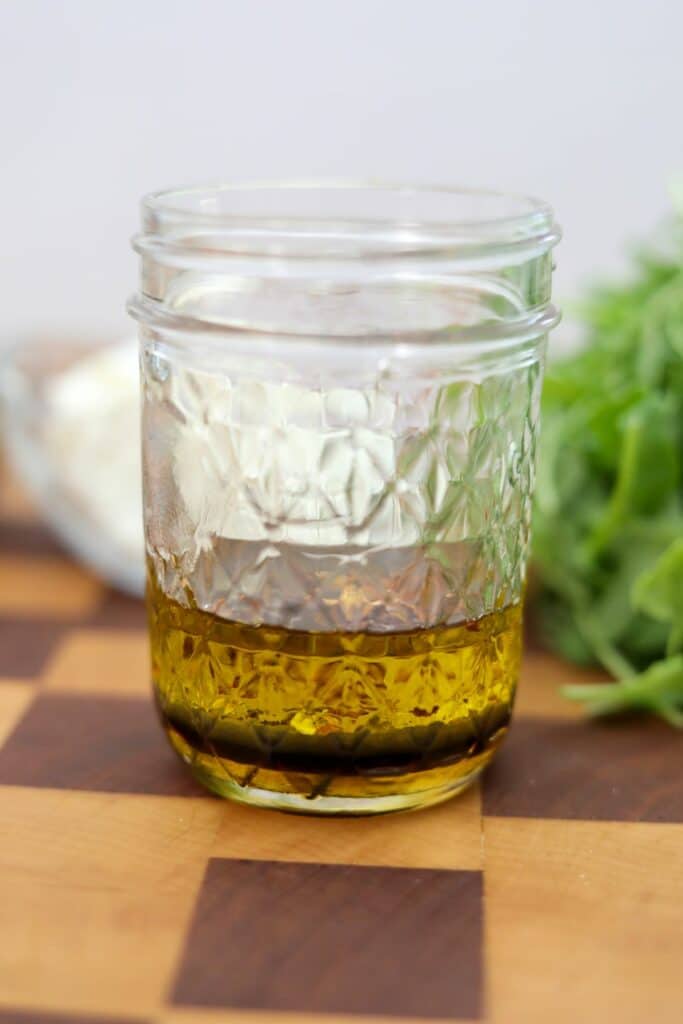 Vinaigrette dressing ingredients in a mason jar