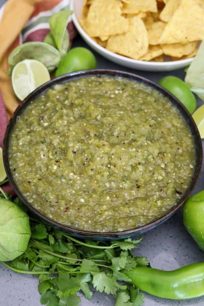 hatch chile salsa verde in a bowl next to chips