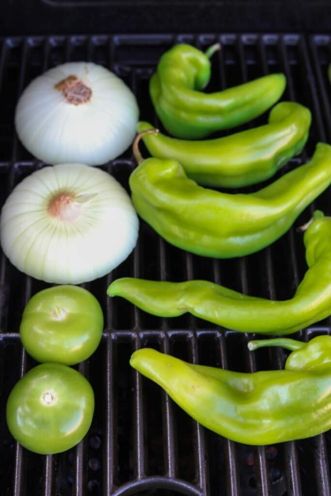 Peppers and onions on a grill