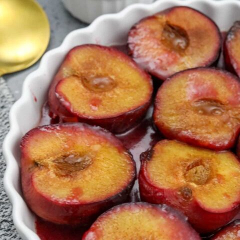Baked plums in a tart dish