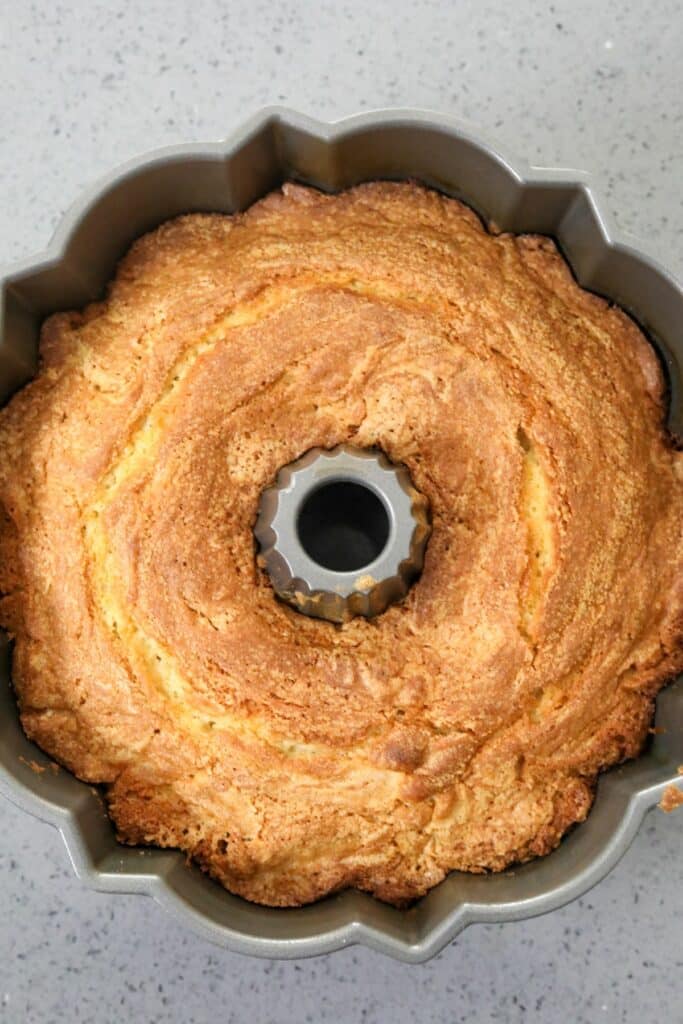 A cooked cake in a bundt pan