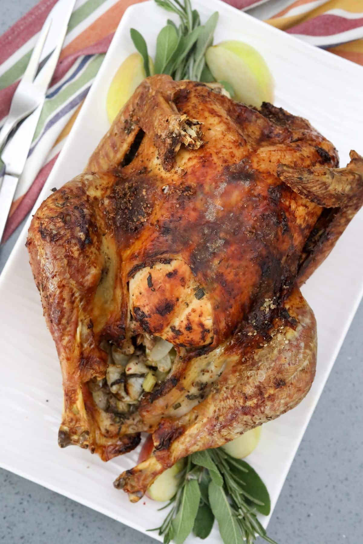 Roast turkey on a white serving platter
