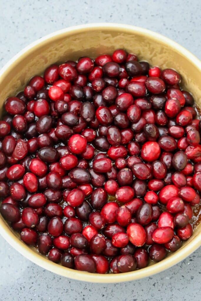 Cranberries and glaze in the bottom of the cake pan