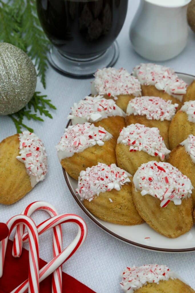 White chocolate peppermint madeleines on a white plate