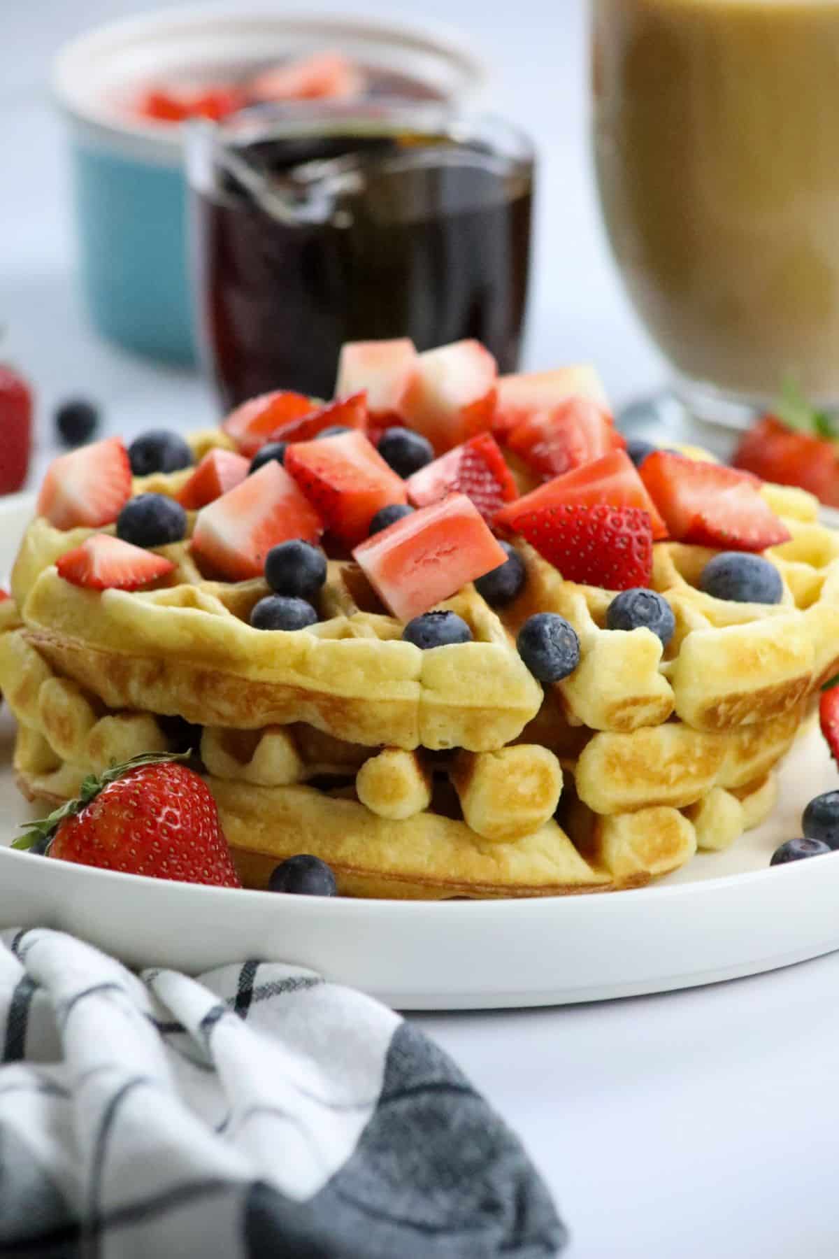 Close up of Belgian waffles on a white plate